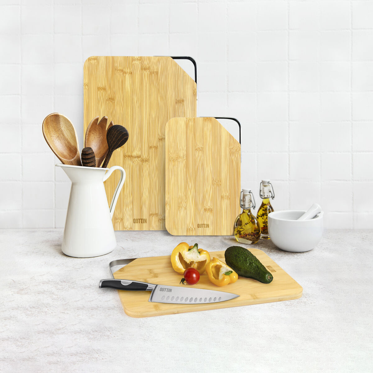 Kitchen utensils, tools and dishware on on the background white tile wall. Interior, modern kitchen space in bright colors. Blank space for a text, front view S2238460_3